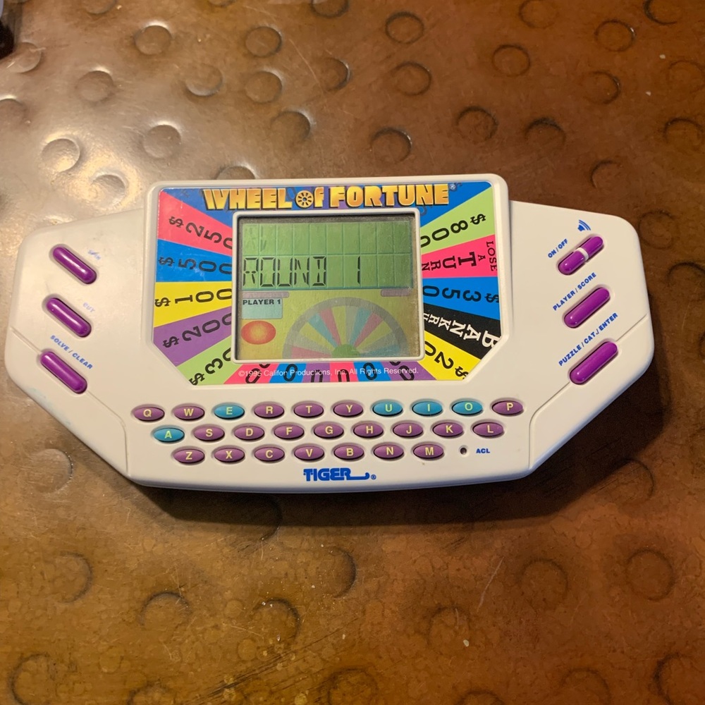 Official 1995 Wheel Of Fortune TIGER Electronic Handheld Video Game